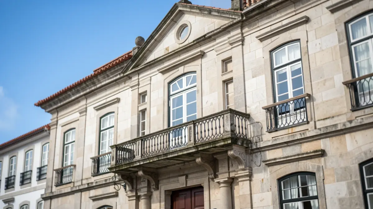 Generic image of the facade of a Portuguese municipal building with traditional architectural details.