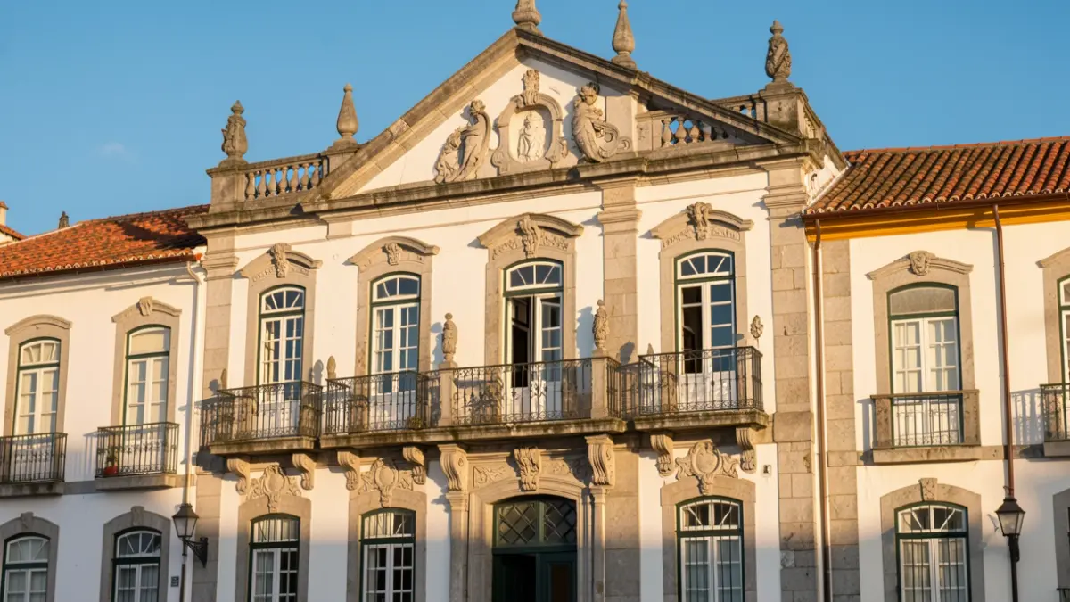 Generic image of the facade of a Portuguese municipal building in the sun.